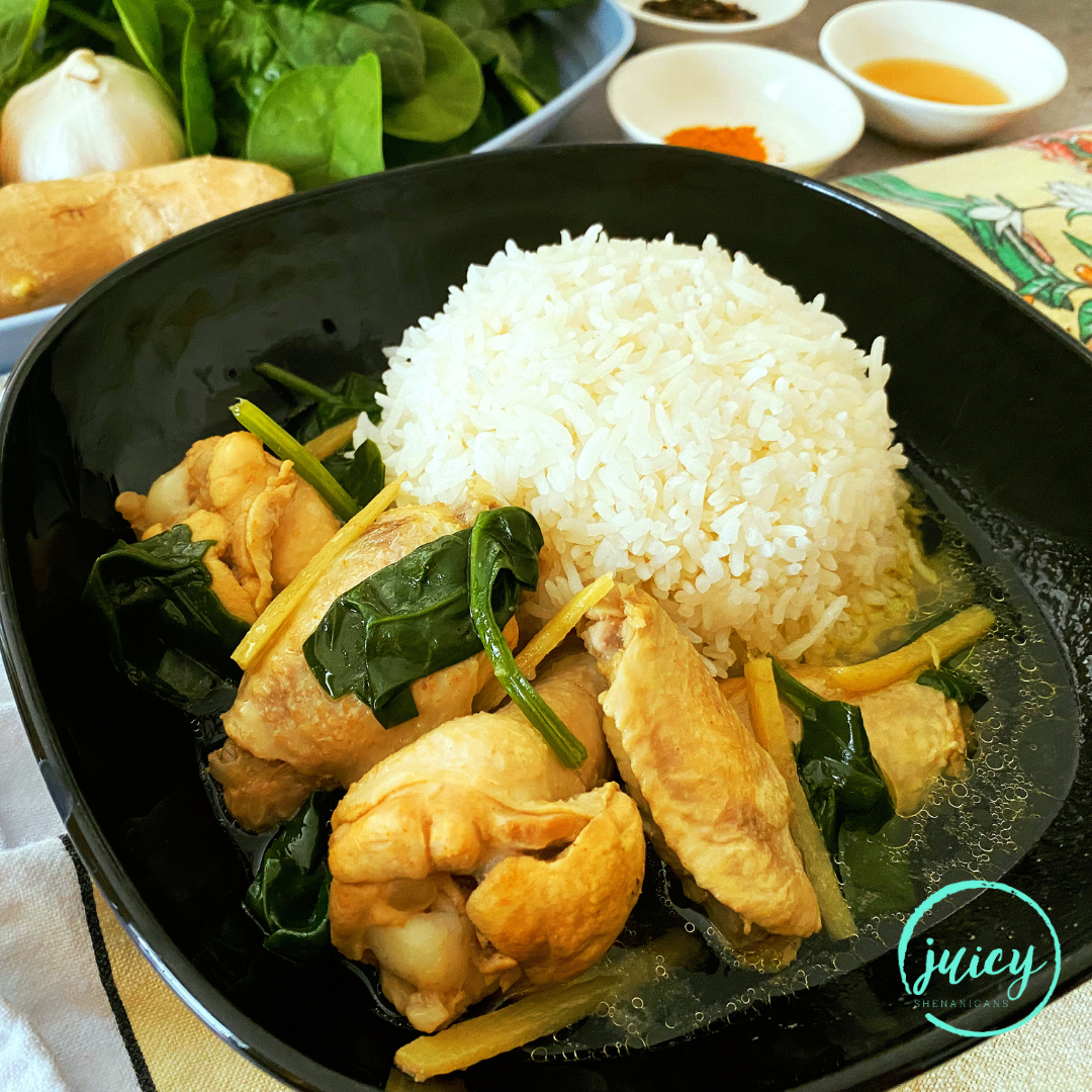 Traditional Filipino Tinola served in a square black plate, with steamed jasmine rice. Ingredients used to create the dish are pictured in the background.