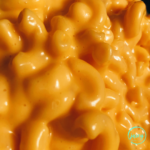 Close up image of a very creamy, indulgent mac and cheese.